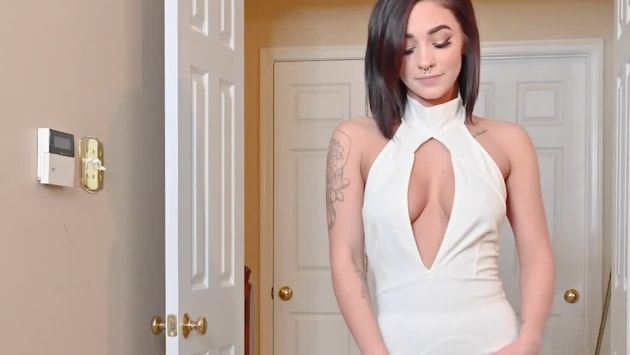Caroline Moore Takes Off Her White Dress