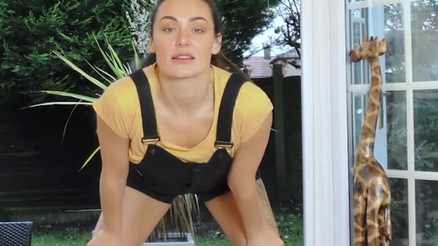 Tania Takes Off Her Overalls